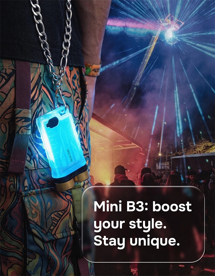 Beaconix B3 Mini glowing blue on a chain at a night festival