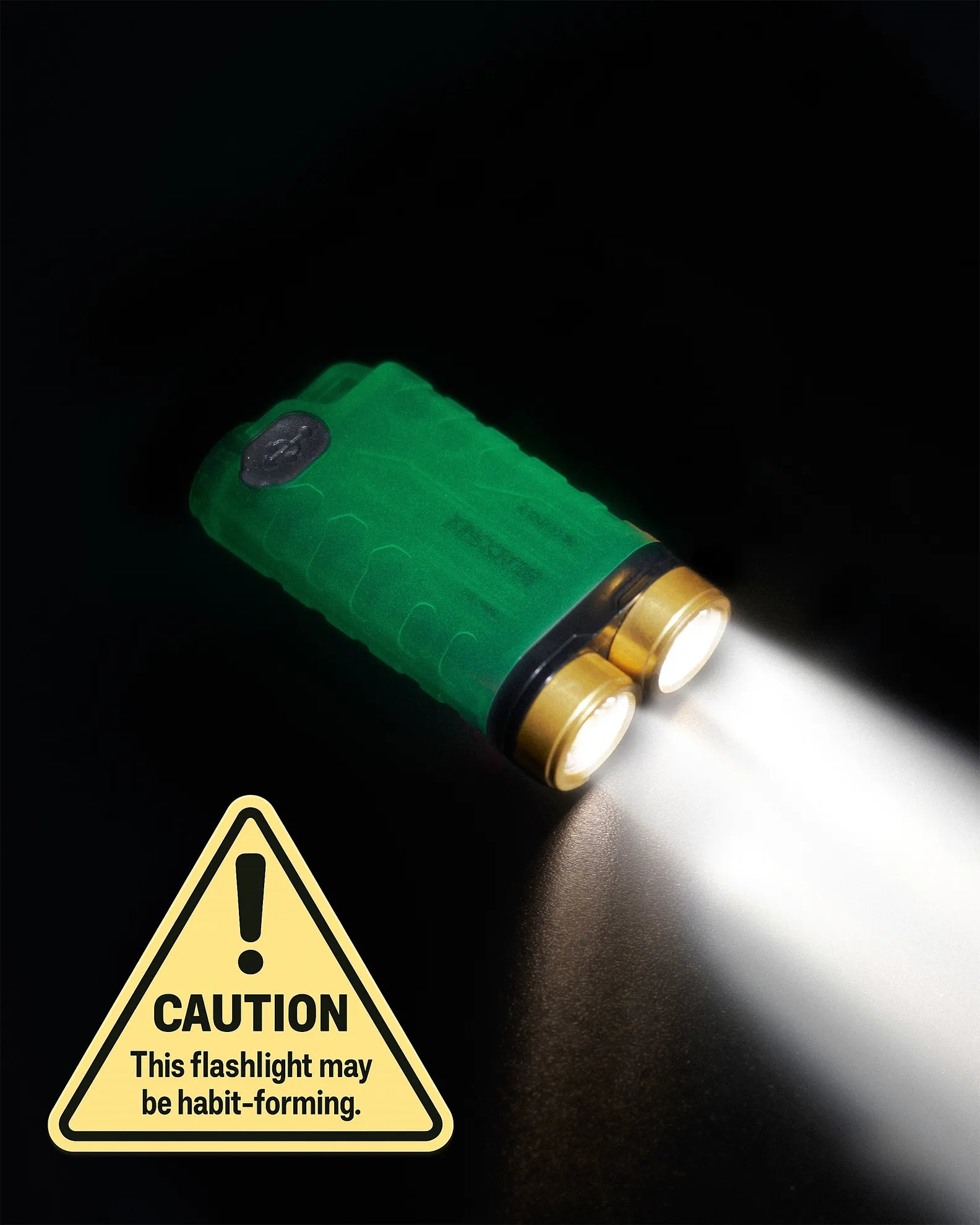 Beaconix B3 Mini with a glow-in-the-dark green body shining a white beam